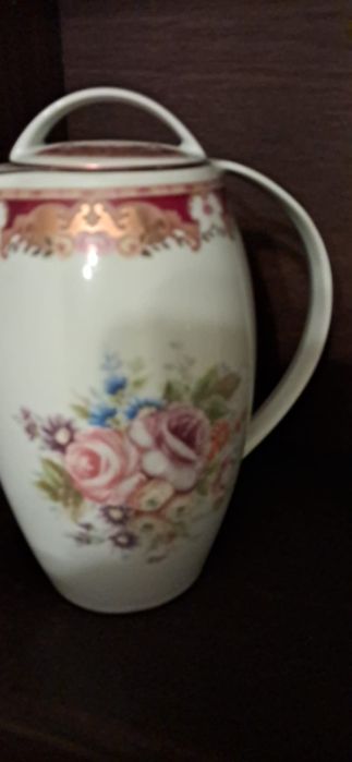 Hand-painted Limoges teapot and plates.