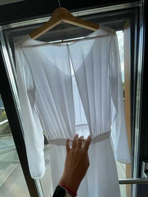 Piękna i delikatna sukienka ślubna