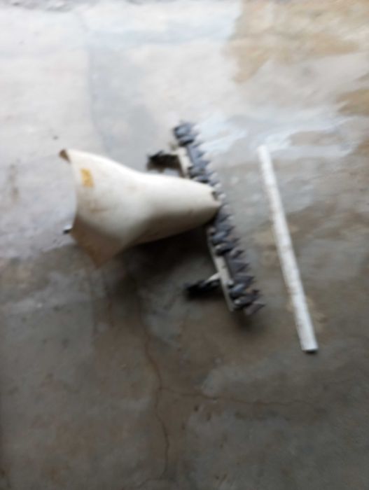 Motocultivador com capinadeira/ pente