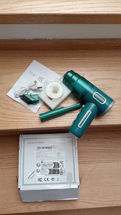 Mini aspirador portátil