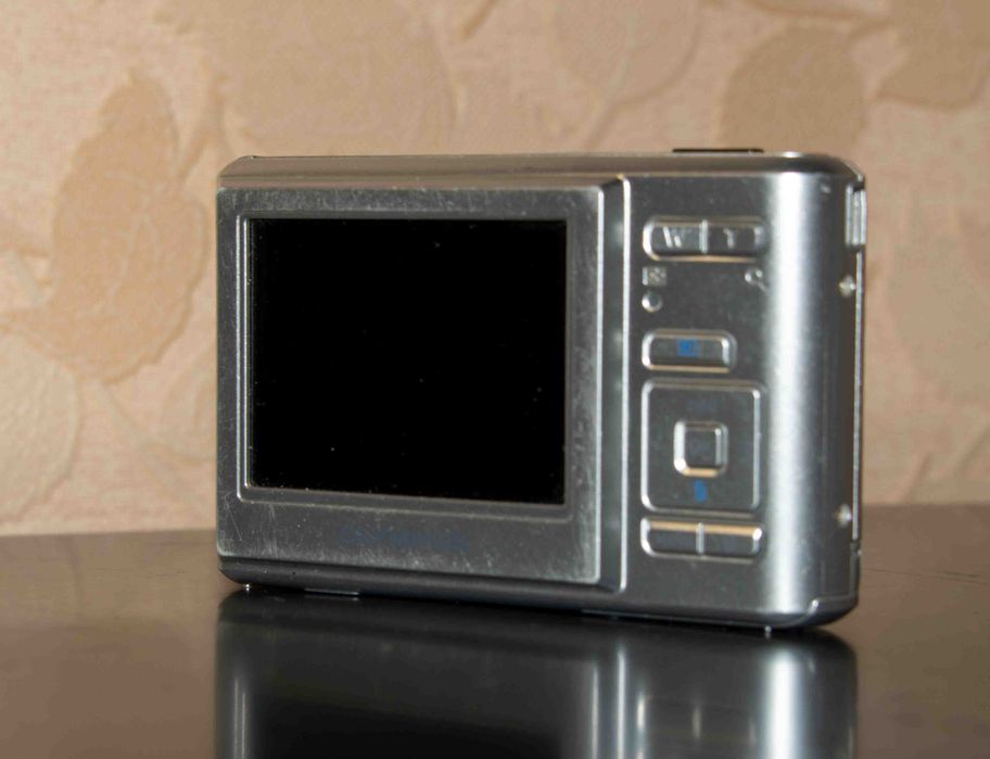 Коллекционный цифровой фотоаппарат Olympus T-100 zoom 12Мп.