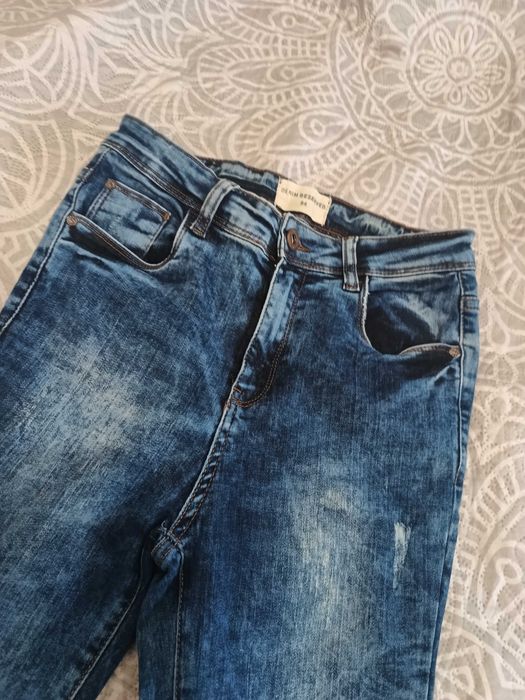 Damskie jeansy Reserved