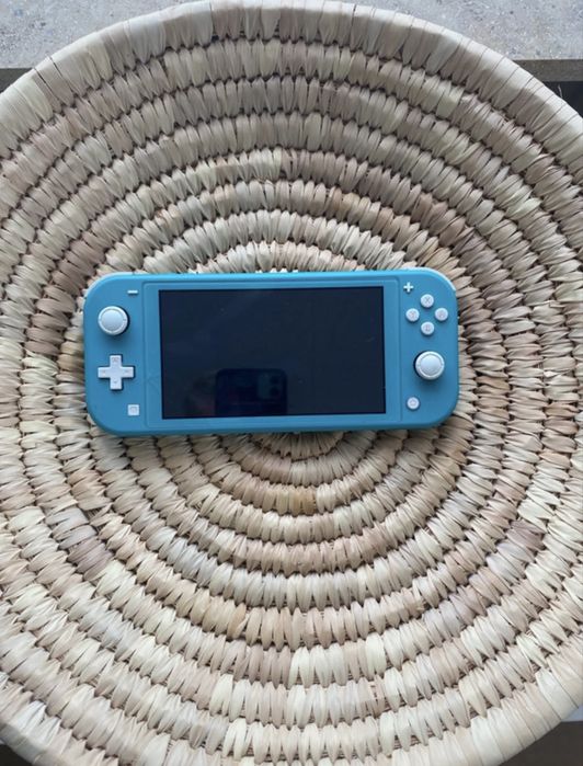 Nintendo switch lite azul/troca