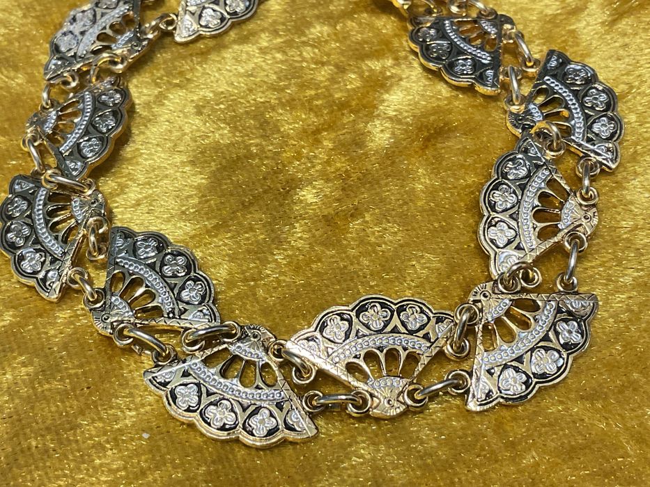 Pulseira tema leques cor ouro 20 cm