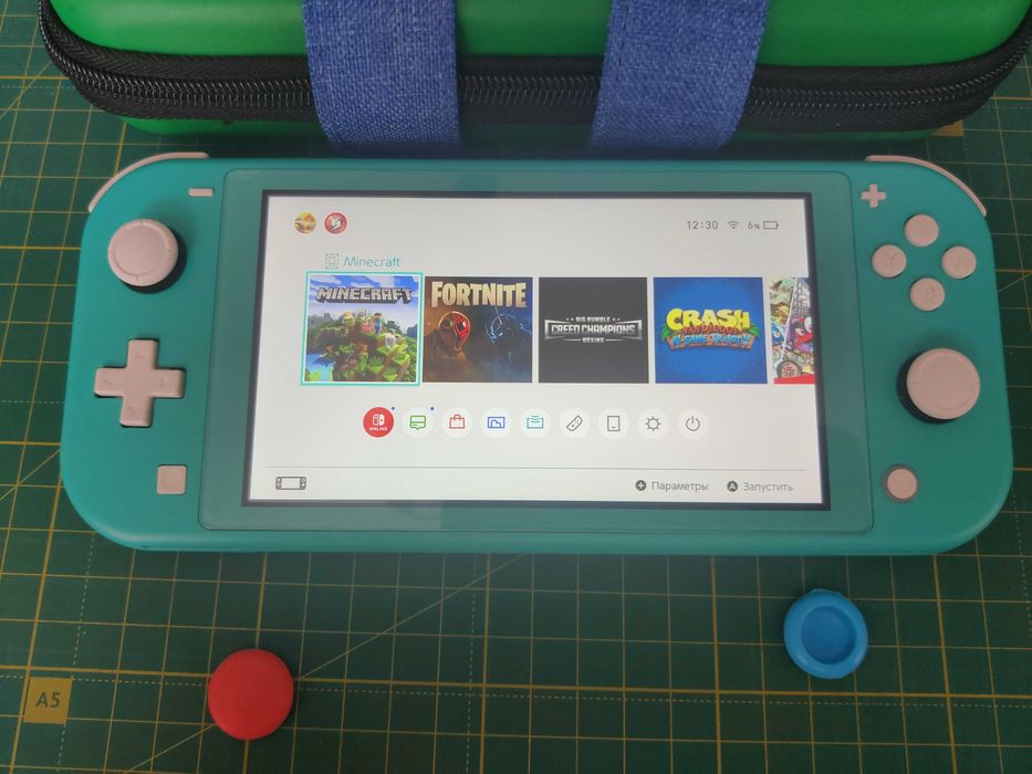 Nintendo Switch Lite Turquoise + 6 ігор (картриджі) / Ідеальний стан