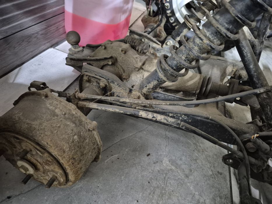 Oś tylna dyfer hamulec wahacz Suzuki Eiger 400