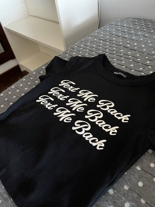 T-shirt pequena preta