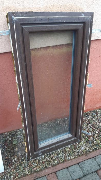 Okna PCV w kolorze dąb bagienny.