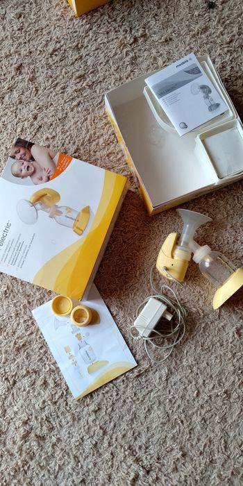 Молокоотсос MEDELA электрический