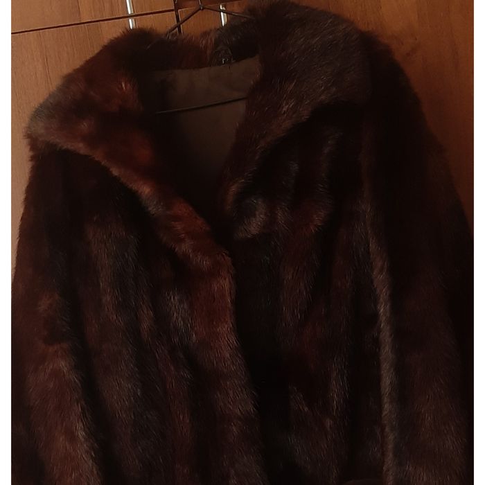 Норкова в ідеальному стані шуба.