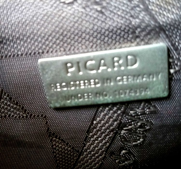 Маленька шкіряна сумочка