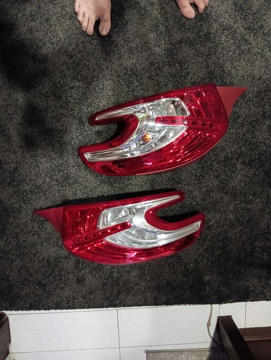 Conjunto faróis origem Peugeot 208