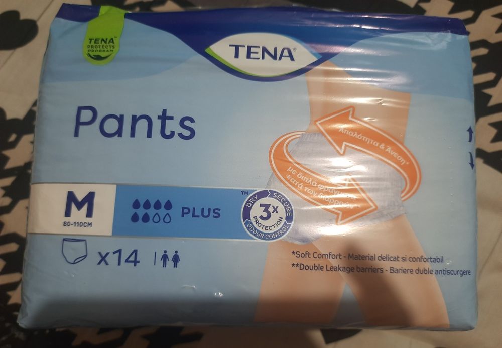 Подгузники - трусики . Tena M