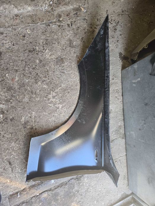 błotnik przód BMW seria 1 E81 E82 E87 E88 nowy