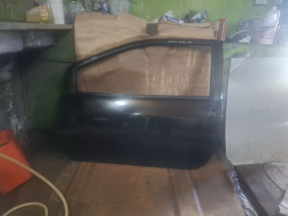 Porta; Frete esq^ Renault Tuwingo ano2003