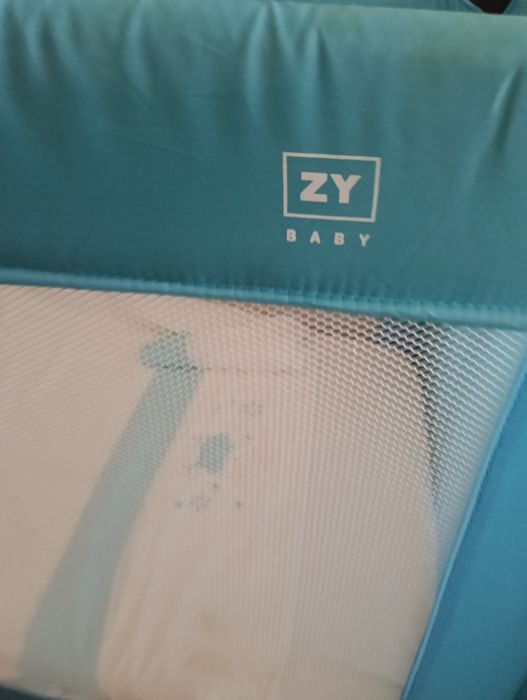 Cama de viagem azul