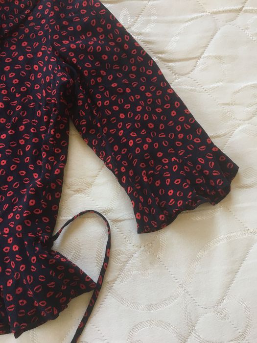 Жіноча блуза з рюшами