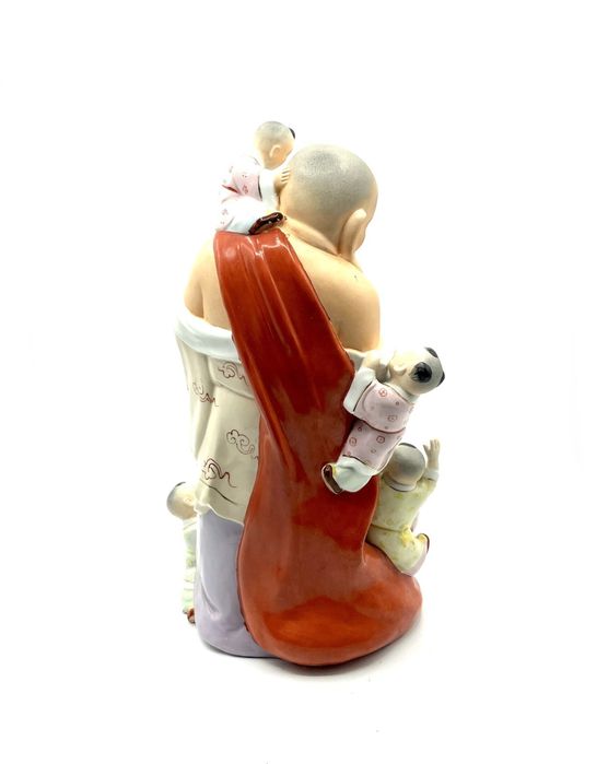 Buda em porcelana antigo