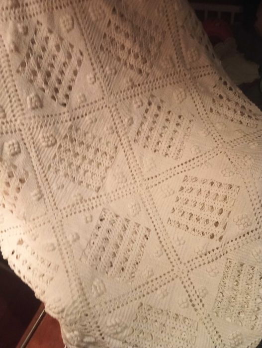 Coberta de renda feita á mão