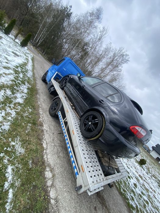 Laweta transport samochodow łodzi przyczep pomoc drogowa