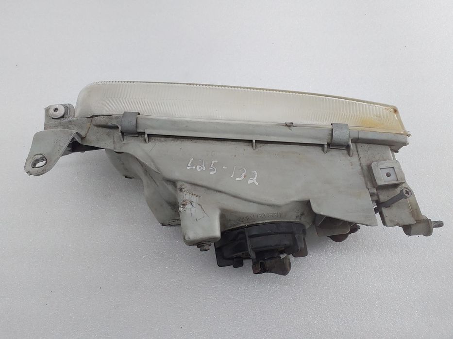 Ótica / farol direita TOYOTA Corolla Compact (_E10_)