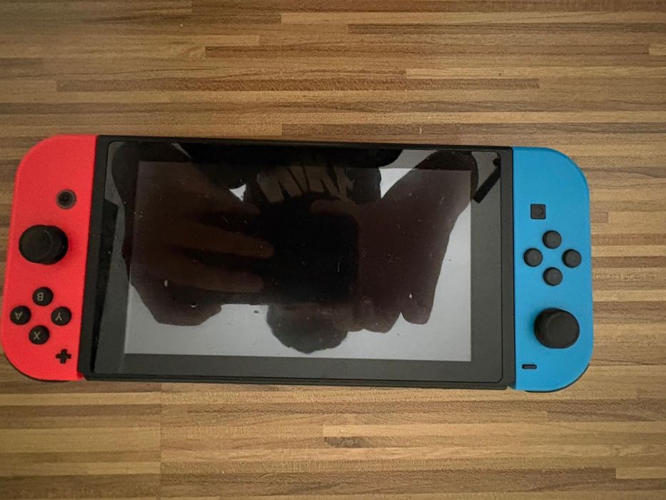 Konsola Nintendo switch gry x3 jak nowa  pudelko