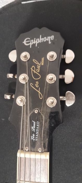 Guitarra, amplificador e mochila
