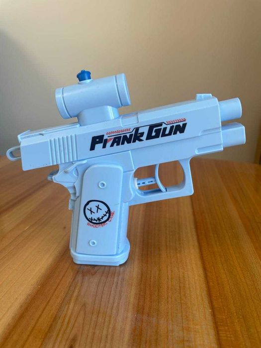 Жартівливий водяний пістолет двосторонній бластер Prank Gun для розіграшів