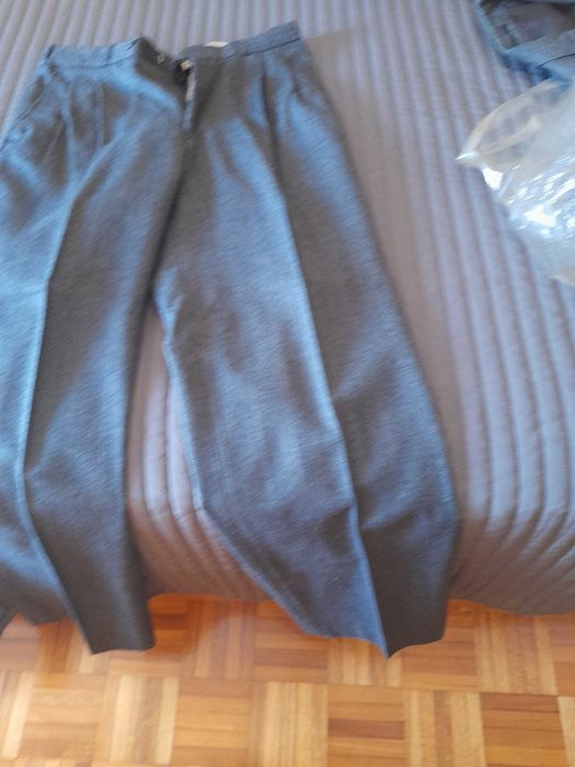 Selling a dark gray suit with light gray stripes