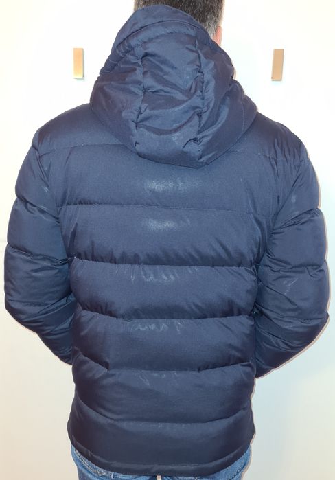 Casaco de penas de homem