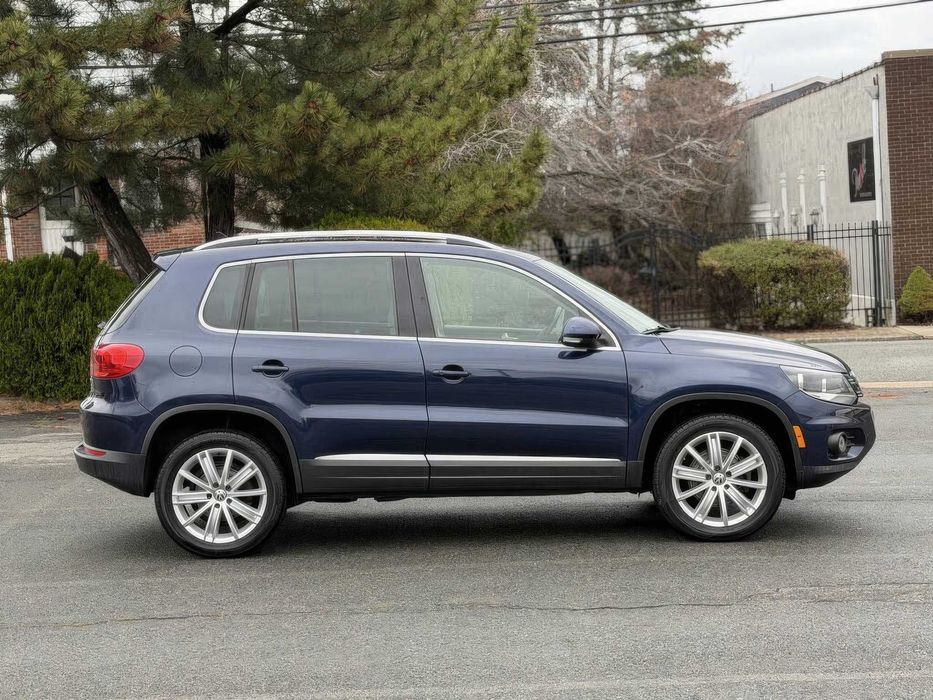 Volkswagen Tiguan 2.0      2014