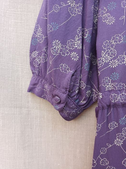 Blusa roxa manga curta