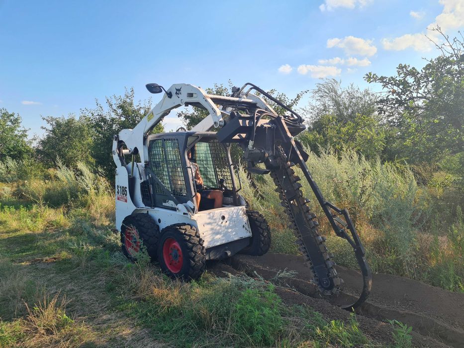 Земельные работы . Услуги траншеекопателя / бары на базе Bobcat ...