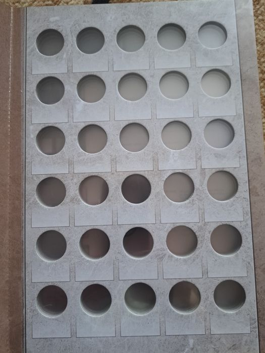 Album na monety 2zł plus 5zł.