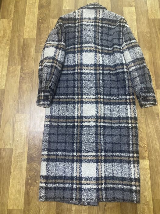Стильне пальто в клітинку, актуальне на осінній сезон
