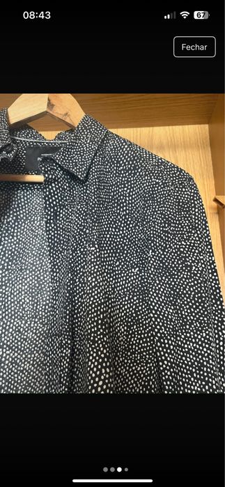 camisa preta com bolinhas