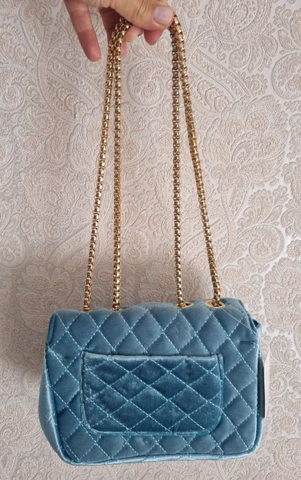 Mala de veludo azul celeste