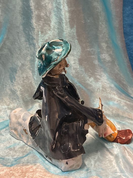 Escultura faiança 23x25 cm