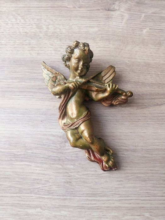 Anjo decorativo dourado