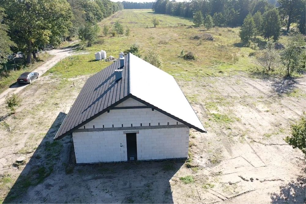 Dom parterowy ,wolnostojący  w Ochli - duża dzialka .