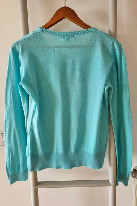 Camisola azul turquesa da marca Antea do El Corte Inglés