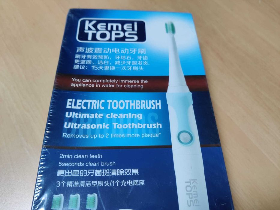 Escova de dentes elétrica Kemei Tops