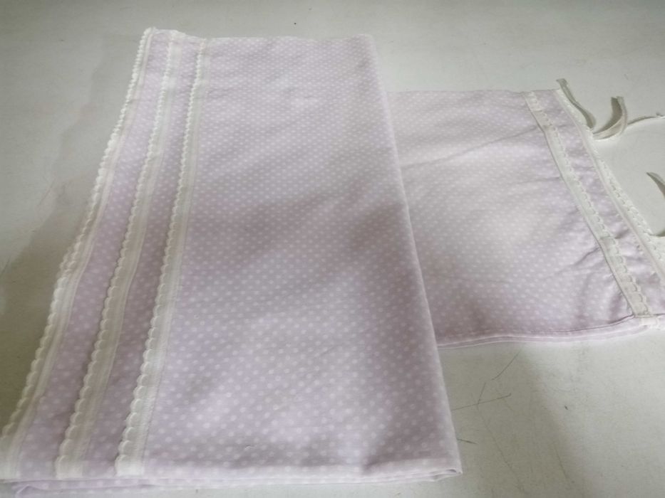 Lençóis de bebé em cores e em branco