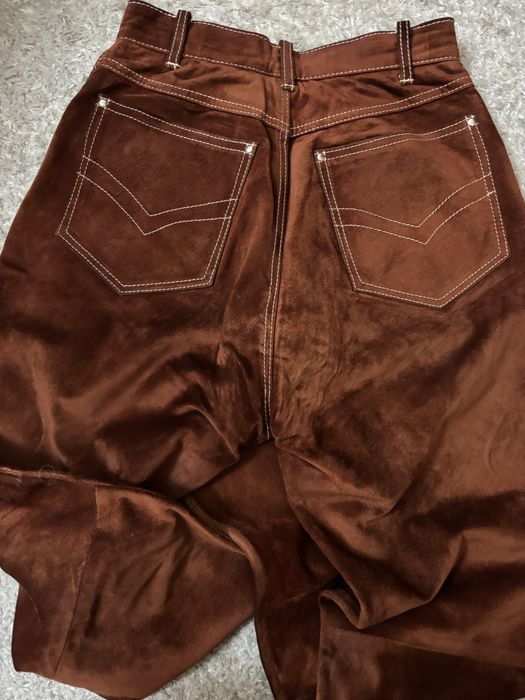 Calças em pele genuina