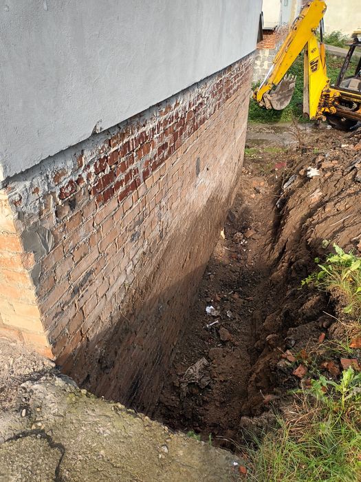 Екскаватор навантажувач Послуги