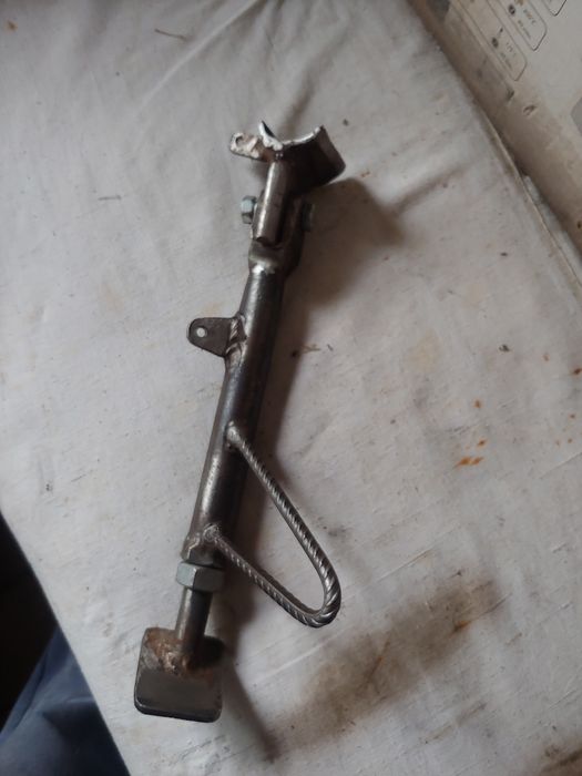 Бокова підніжка  з регулюванням по висоті. Ручна робота