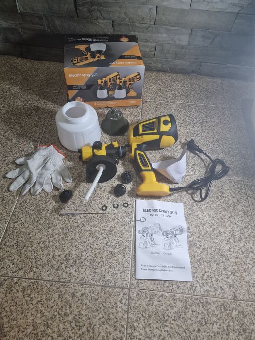 pistola de pintura elétrica HVLP amarela, com potência que varia entre 650W e 850W.