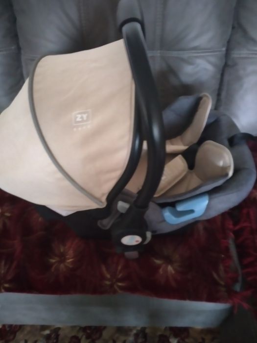 Дитяча коляска три в одному