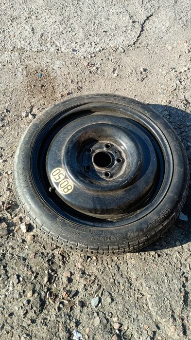 Koło zapasowe Toyota Corolla e21