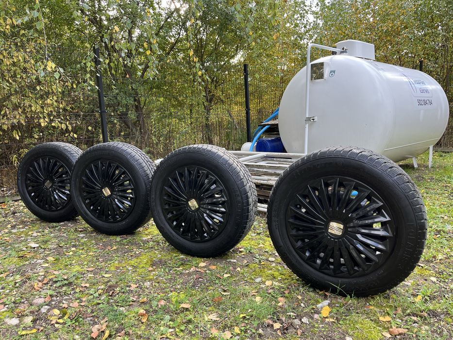 Felgi stalowe +opony zimowe Barum Polaris3+kołpaki seat